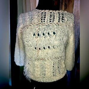 Unique hand woven sweater with leathers interwoven